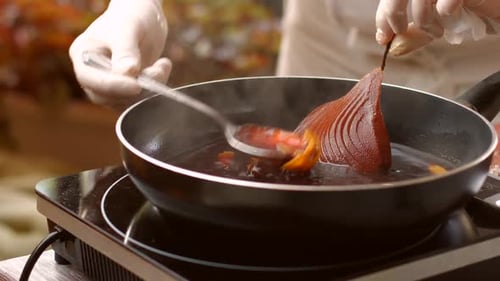 Peeled Pear on Frying Pan.