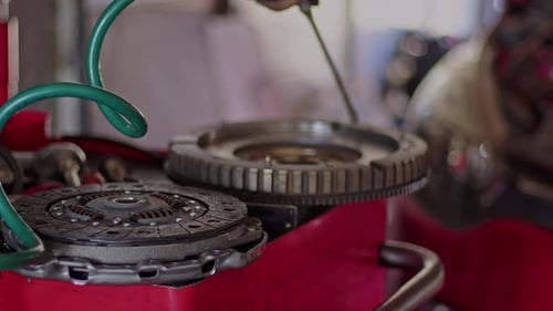 Cleaning The Clutch Compressor With Air Compressor In The Workshop