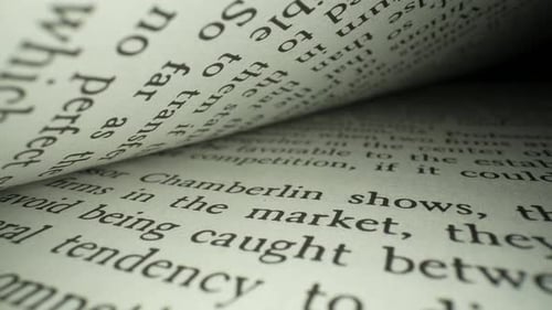 Macro Footage of Text in Open Book