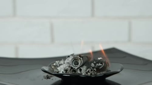 Burning money.
