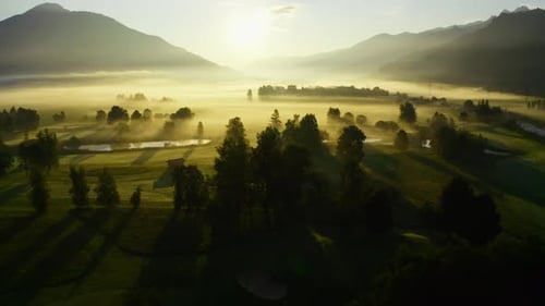 Misty Landscape at Sunrise Aerial View