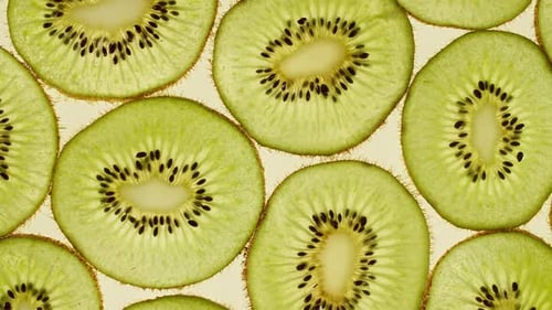 Macro Shot of Transparent Slice of Kiwi Fruit and Rotate