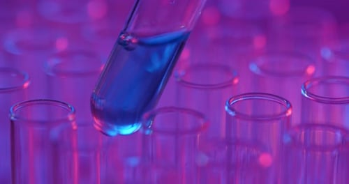 Test Tube with Blue Liquid in Laboratory