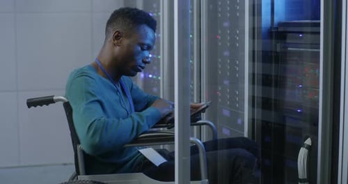 Technician Working in Data Center