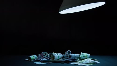 Pile of Euro Banknotes in a Dark Studio