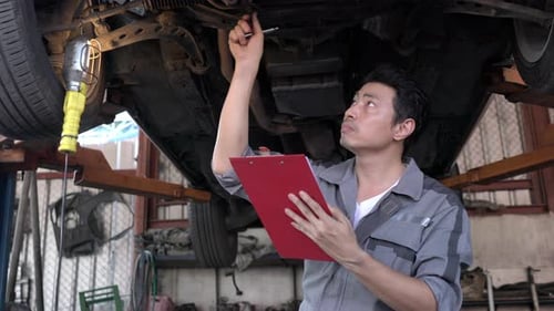 Man checking car