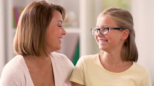 Smiling Mother and Child Together Indoors