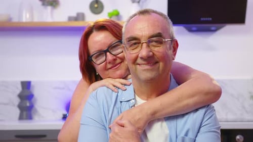 Loving Couple Embracing Affectionately Indoors