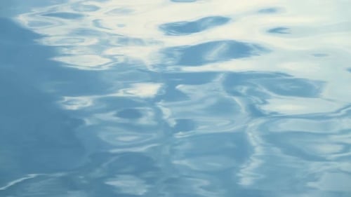 Gentle Water Ripples on Blue Ocean Surface