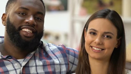 Happy Couple Displaying Heart Shape for Anniversary