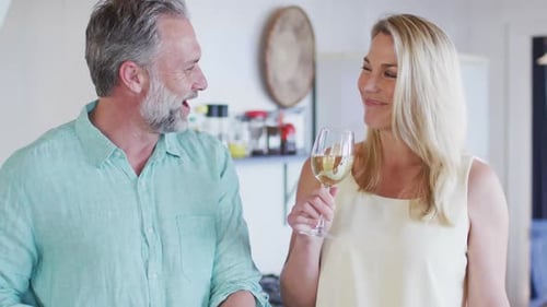 Couple Enjoys Wine at Home Together