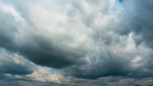 Time-Lapse of Dramatic Clouds in a Blue Sky