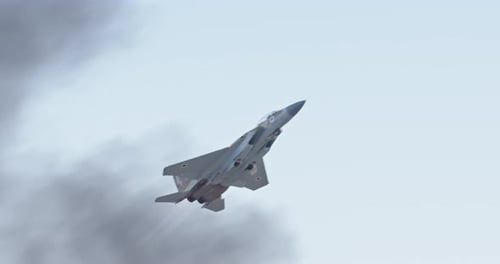 Fighter Jet Taking Off from Desert Airfield