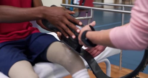 Man Fitted with Prosthetic Leg in Clinic