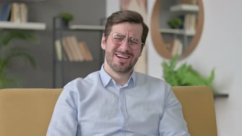 Man Reacts with Joy Then Disappointment