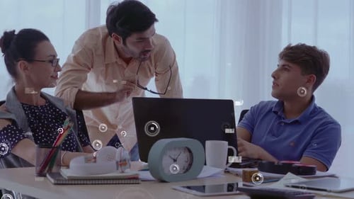 Office Scene with Colleagues Discussing Business