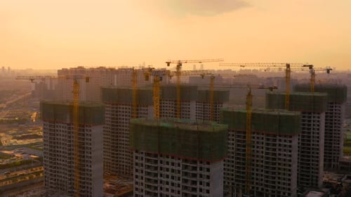 Aerial of construction site at sunset