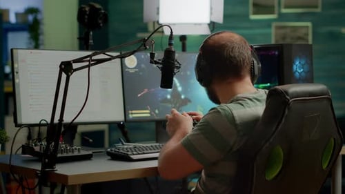 Young Adult Playing Video Games With Streaming Setup