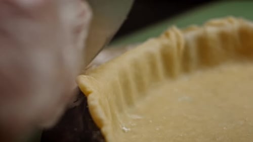 Trimming Pie Dough on a Metal Pan