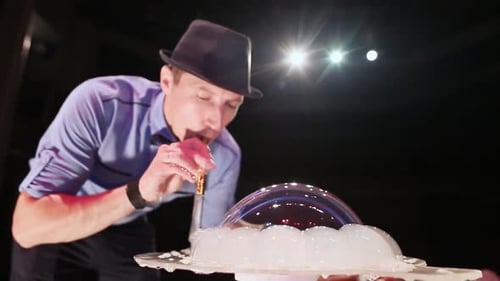 Man Makes Giant Bubble with Smoke