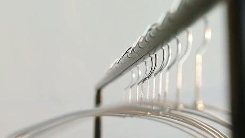 Silver Metal Clothes Hangers on a Rack