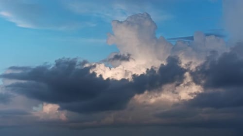 Clouds Forming in a Bright Blue Sky