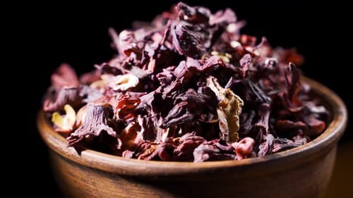 Rotating Bowl Full of Dried Hibiscus Flowers