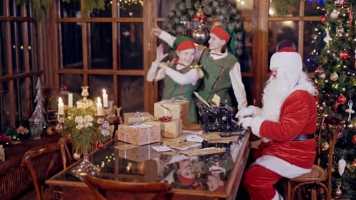 Santa with Elves in Festive Christmas Workshop