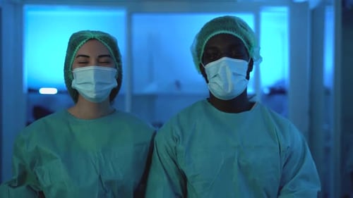 Health Workers in Scrubs in Sterile Environment