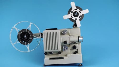Vintage 8mm Film Projector with Moving Reels
