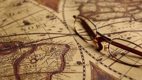 Vintage Map and Eyeglasses Close Up