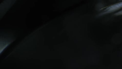 Abstract Dark Texture with Light Leaks Background