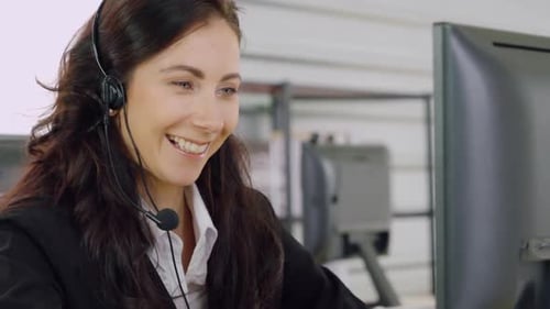 Business People Wearing Headset Working in Office