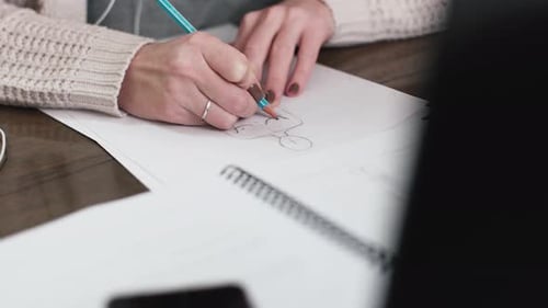 Fashion Designer Drawing Clothing Design Sketch