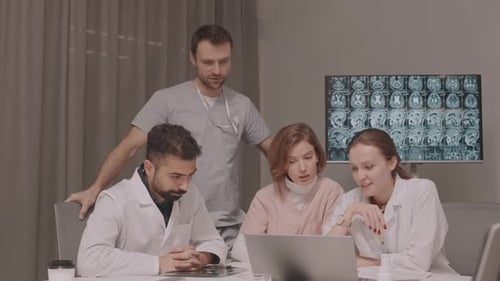 Medical Team Collaborating in a Modern Office