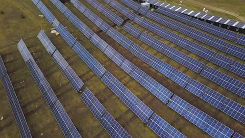 Solar Panels Farm (solar cell). Renewable green alternative energy concept - Aerial view