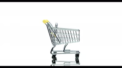 Empty Shopping Cart in Motion Isolated on White Background, Copy Space