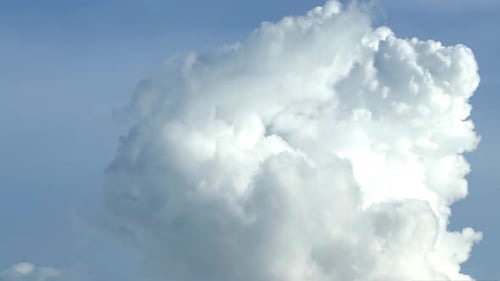 White Clouds Drifting Across Blue Sky During Daytime