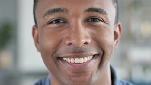 Close Up of Smiling Young Adult Man