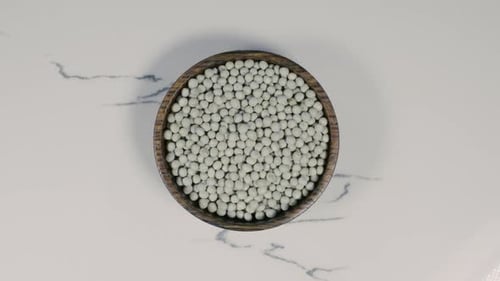 Overhead View of White Peas in Wooden Bowl