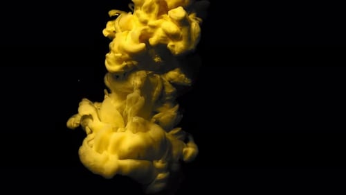 Golden Yellow Paint Swirls on Black Background