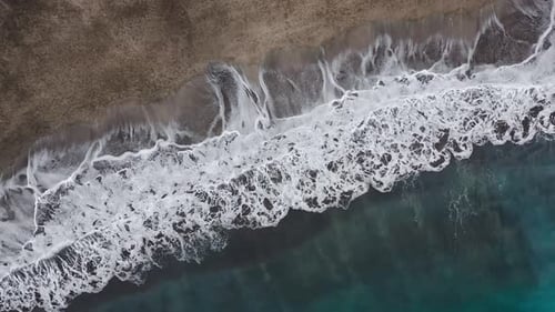 Top View of the Desert Black Beach on the Atlantic Ocean