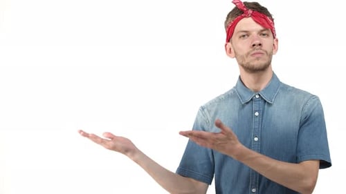 Young Adult in Bandana Gesturing with Open Palm