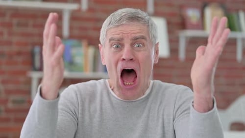 Man Reacts to Shocking News in Close Up