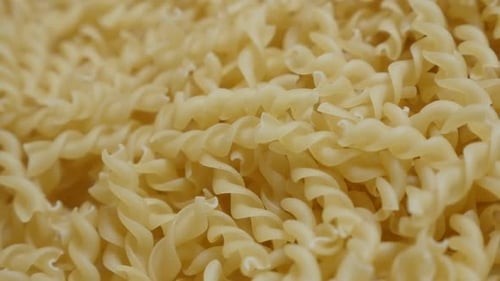 Close-Up View of Uncooked Spiral Pasta