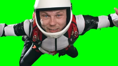Skydiver Smiles and Gives Thumbs Up on Greenscreen