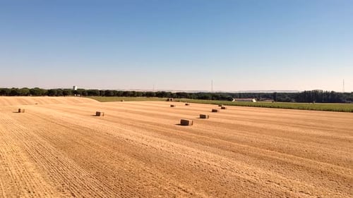 Rural Farm Land with Bales of Hay