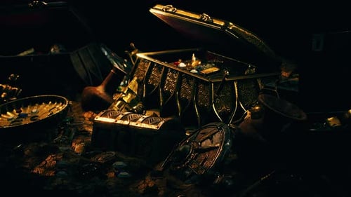 Treasures in a Dark Cave with Coins Diamonds and Gold