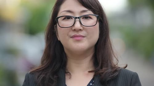 Confident Woman in Business Suit Close Up