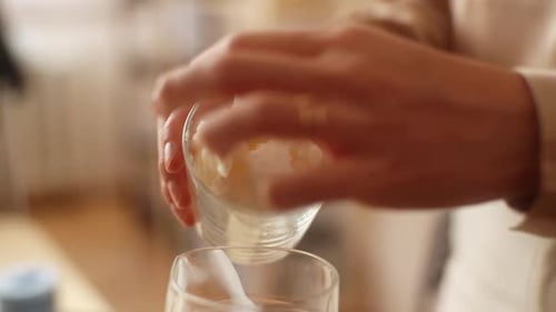 Adding Shaved Ice to a Clear Glass